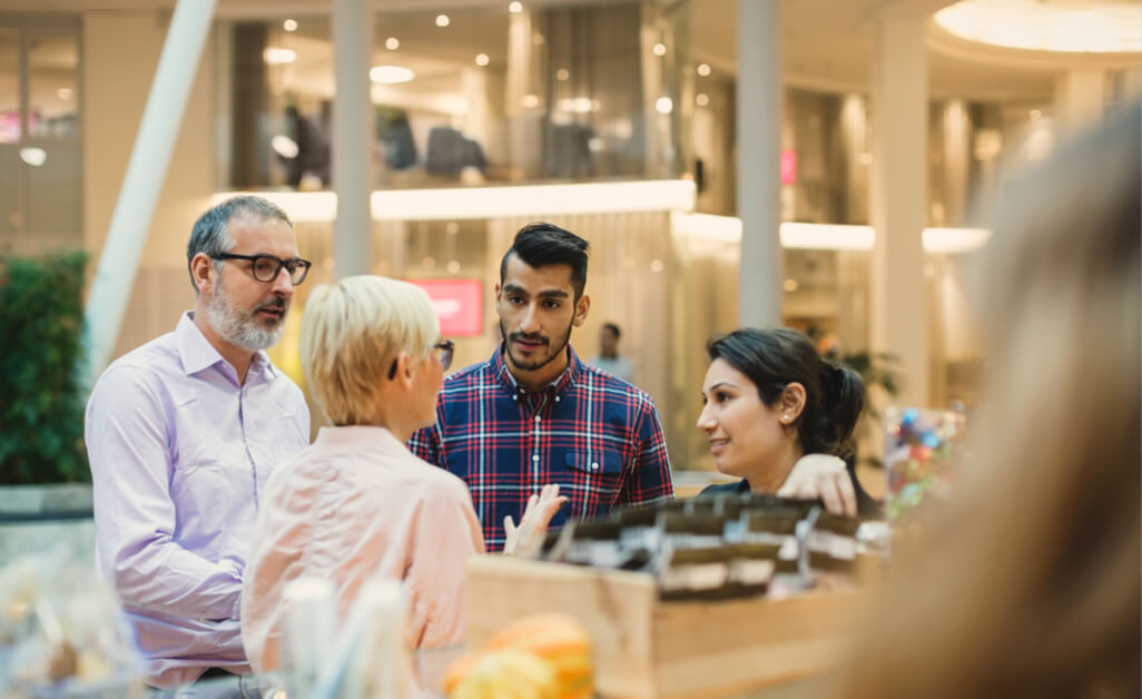 Group of people talking in a modern space